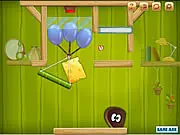 The mouse in Cheese Hunt 2 eagerly waiting for a block of cheese being guided through a complex puzzle course