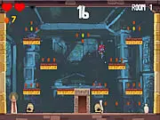Screenshot from Tomb Cat game showing a small cat character jumping across a pit to avoid a deadly spike trap on a retro Egyptian-themed platformer level.