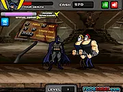 Batman Defend Gotham free online game screenshot showing The Dark Knight fighting Joker's henchmen in the streets of Gotham City
