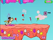 Screenshot of Dora the Explorer riding a small pony along a colorful, looping trail, collecting horseshoes and jumping over a small hurdle.
