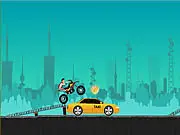 A dirt bike rider airborne over a huge jump, attempting to collect yellow stars in the extreme motorcycle stunt game Crazy Stunts 2.