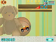 Toy Car Adventure free online racing game screenshot, little car driving across household furniture