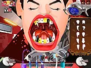 Screenshot of Dracula's Dentist gameplay showing a cartoon Dracula character with a large open mouth receiving dental care from the player.
