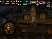 Screenshot from Halloween Sniper showing a sniper scope view and silhouettes of zombies in a spooky, dark city environment