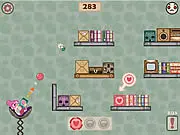 KizztenZ game screen showing a cartoon Grandma aiming a science projectile chair at several cute, infected kittens on a complex puzzle platform