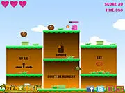 Play The Hungry Game free online platformer - Pink character eating food and spitting fire at monsters