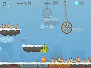 The cute green creature in Roventura jumping over an obstacle to collect a sparkling crystal in the free online adventure game