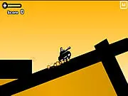 Tankman Training game screenshot showing a black and white tank driving over a challenging jump on an obstacle course