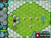 Hexagon Planet TD free tower defense game showing a colorful map of connected hexagonal sectors with defense towers built to stop enemy paths