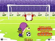 X-mas Penalties game screenshot showing a soccer player kicking a ball towards a goal with a festive, snow-covered background, free online football game