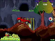 Screenshot of Car Mania Stunt Racing Online showing a powerful truck jumping high over a massive obstacle on a challenging dirt track