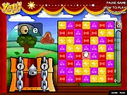 Gameplay screenshot of Animals Home Free, a free online puzzle game, showing a grid of colored tiles, keys, and locked animal cages waiting to be unlocked.