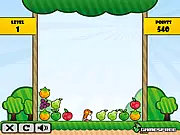Greedy Mole Puzzle online game screenshot showing colorful cartoon fruit tiles and the hungry mole character ready to make a match-3 group
