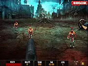 Zombie Take Down free online game screenshot showing a first-person view of a player shooting at incoming undead zombies.