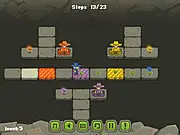Gameplay screenshot of Greedy Sheriffs showing two sheriff characters in a cave surrounded by diamonds, a teleporter, and obstacles that form a challenging puzzle