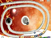 Zuma Winter Edition game screenshot, festive marble shooter puzzle with Christmas tree balls, free online game