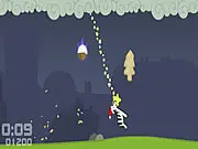 James the Christmas Zebra online game screenshot, a zebra swinging from a cloud towards a cookie, avoiding an explosive pudding, free arcade game