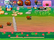Snail Race free online racing game screenshot, showing a cute snail character speeding across a colorful track after collecting a power-up sign.