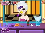 The main game screen of Ever After High Raven Queen Makeover, showing Raven Queen receiving a facial or being dressed up in a new outfit