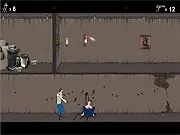 Russian Affairs free online flash game screenshot showing a man with a gun in a dark, grimy industrial interior, ready for a gunfight.