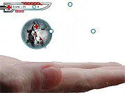 Brainbots game screen showing a small mechanical nanobot avatar shooting energy blasts at several hostile alien micro-organisms inside a colorful, stylized brain pathway.
