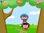 Screenshot of Balance War free online game showing two bouncing characters on a see-saw aiming to collect yellow stars in the sky.