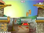 The catapult launching a projectile toward a wooden structure in the Cat-Vac Catapult 2 online physics puzzle game.