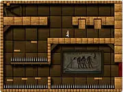 Indiana Jones character dodging a deadly booby trap inside an ancient Egyptian tomb in the free online adventure game.
