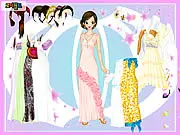 Ball Gown Dress up game screen showing an elegant girl modeling a magnificent dress for a grand ball