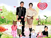 Two celebrity figures, Angelina Jolie and Brad Pitt, displayed with various fashion options in the Big Family Dress Up free online game