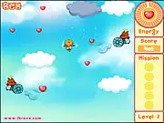 Screenshot of Flying Kitten online game, showing a cat flying up and dodging blocks