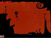Jacko In Hell game screenshot, a pumpkin-headed character jumping over a lava pit in a dark, cave-like environment.