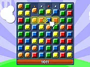 TriPop Match 3 online game screenshot showing a grid of colorful, glittering gems ready to be swapped and matched.
