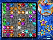 Baby Ada's Beans match 5 puzzle game screen with multi-colored beans arranged on a grid, showing a potential diagonal line match