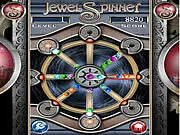 Jewel Spinner Action free online game screenshot - fast-paced jewel matching game with spinning center piece and colored sliders