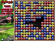 Smilie Clicker puzzle game screenshot, a grid full of various colored smilie faces, showing a large connected group of yellow smilies
