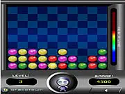 Metal Monster fast board game screenshot showing a grid of contiguous colored balls that need to be cleared.