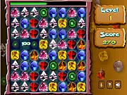 Playing Gem Swap Deluxe free online game, swapping colored gems to make a match 3 combination