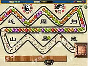 Chinese Gem Quest online game screenshot, showing a winding chain of colorful gems moving toward the Beacon Tower, with a central Chinese pot shooter