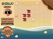 Shinju free online puzzle game screenshot, showing shells and clue numbers for finding the golden pearl