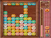 Go Sheep Match 3 online game screenshot, showing colorful sheep puzzle pieces and a black sheep power-up ready to explode