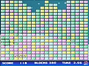 Screenshot of the free online puzzle game Collapse Xmas Edition showing a grid of colored, holiday-themed blocks with a snowy background.