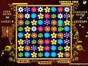Flower Valley gameplay screenshot showing a grid of various colorful flowers on a green background, indicating a strategic matching game against a computer opponent.