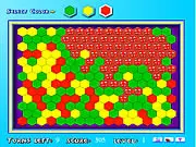Spreading Hex puzzle game board showing a hexagonal grid being covered by adjacent cells of a single color online free