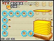 Gameplay screenshot of the Toasted Cheese Mini-Match game showing a grid of covered cards and a partially built giant grilled cheese sandwich.