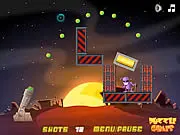 Play Alien Blaster free online puzzle game; shooting alien through physics barriers; game screenshot of Alien Blaster level
