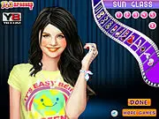 Play Selena Gomez Celebrity Makeover dress up game online; free fashion game for girls; styling celebrity for Christmas party outfit