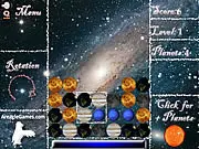 Planetary Twist online game screenshot showing a grid of different colored planets being twisted to form a Match 3 combination.