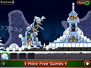 Screenshot of the free online physics shooter game Crazy Christmas showing a launcher aimed at a precarious building with snowballs.