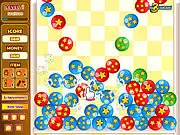 Screenshot of Combo Break online game showing a colorful stack of falling shapes in a physics-based Match 3 puzzle.